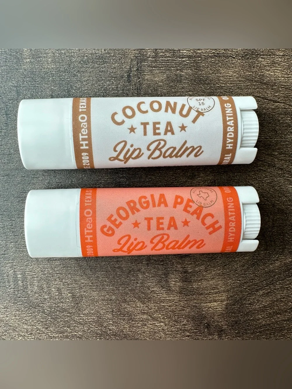 New HTeaO Iced Tea Lip Balm Lot (2) - Coconut Tea SPF 15 & Georgia Peach Tea